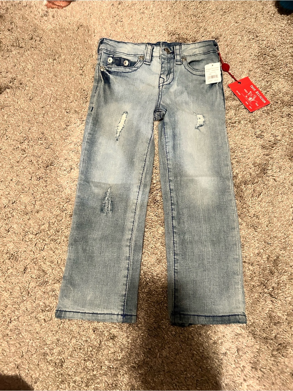 True Religion Light Blue Distressed Boot Cut Jeans